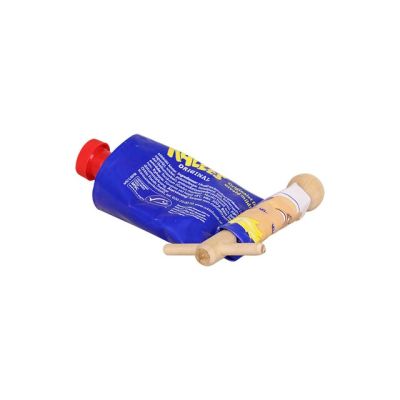 Exprimidor de tubos de madera.
